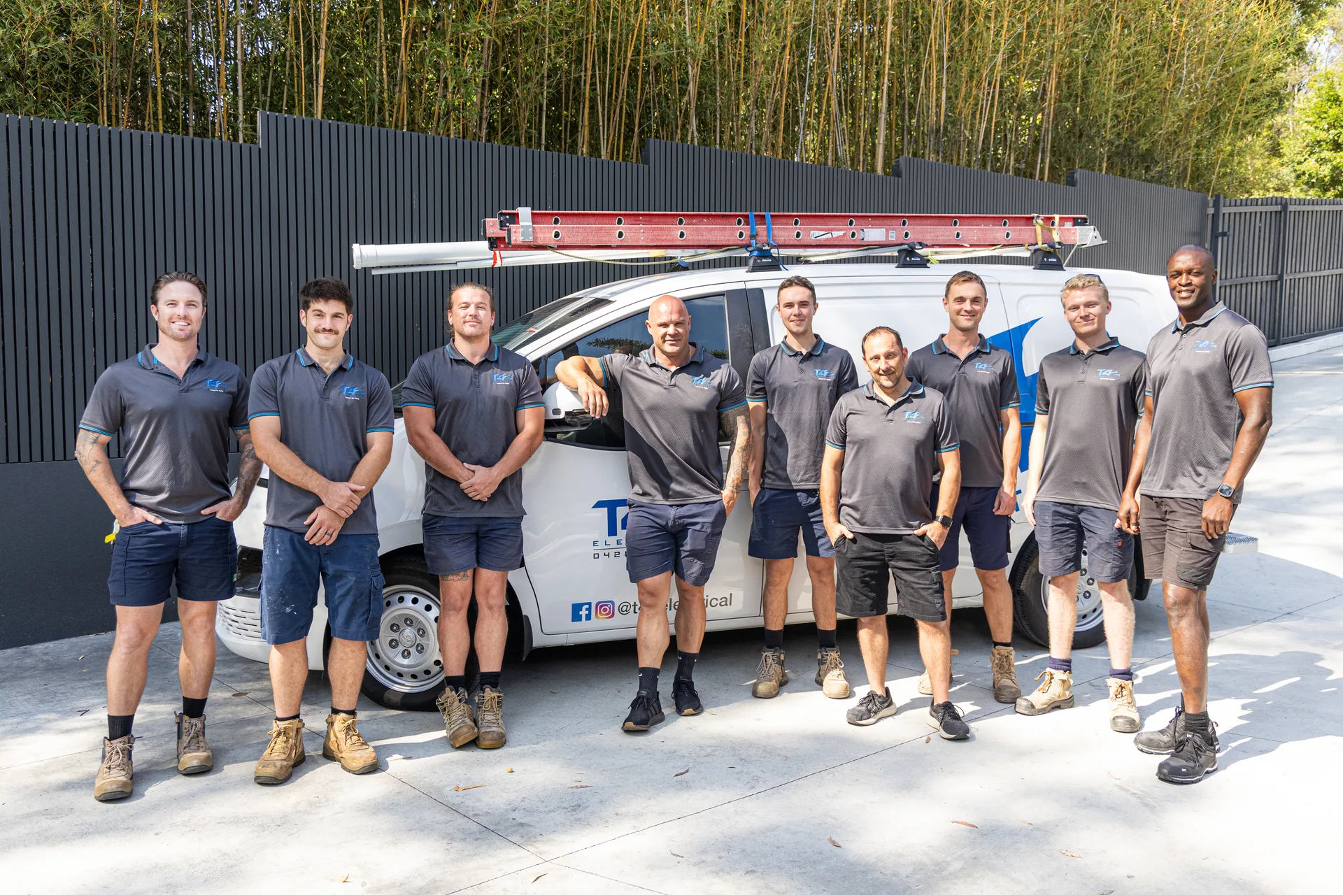 The Air Conditioning Ormeau team with a service van